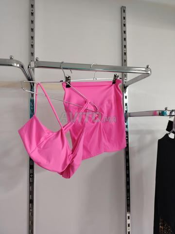 طقم رياضي نسائي وردي XL - 2