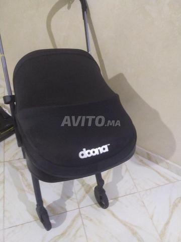 عربة أطفال ومقعد سيارة doona plus - 2