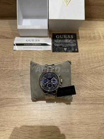 Ajoutez une touche de luxe à votre style avec Guess U0330L9💯💎