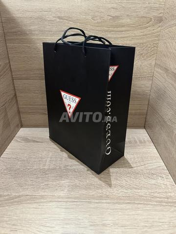 Ajoutez une touche de luxe à votre style avec Guess U0330L9💯💎 - 2