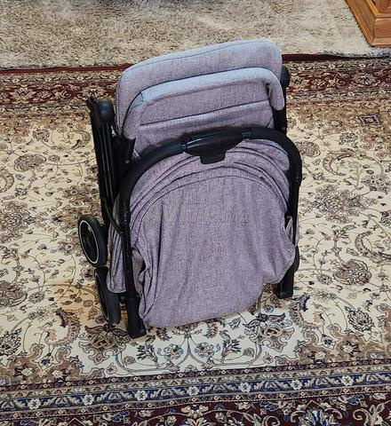 عربة أطفال بحجم حقيبة سفر كالجديدة - 2