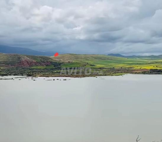 فرصة استثمارية ارض قرب سد ايت زياد للبيع