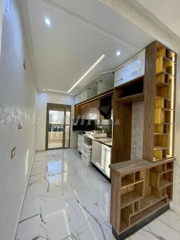 شقة بالمصعد وسط بوزنيقة الطابق الأول للبيع - 2