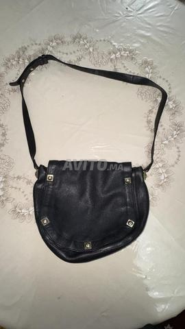 حقيبة كلوي سوداء أصلية