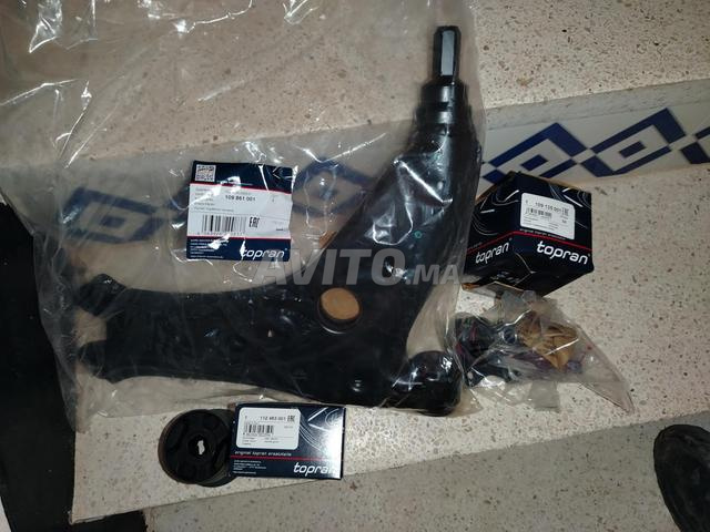 bras de suspension avec rotule avec silent bloc