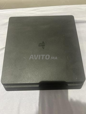 PS4 Slim, 2 Manettes, 4 Jeux - 2