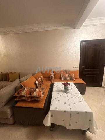 صالون على شكل L مع طاولة - 2