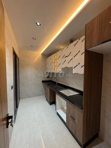 Appartement 61 m² ascenseur balcon aide de l'état petit immeuble