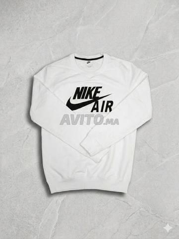 سويت شيرت نايكي اير أصلي بحالة شبه جديدة - 2