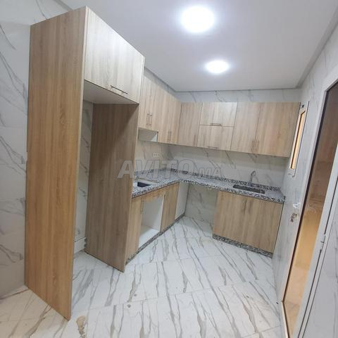 Appartement parking ascenseur balcon marié 3500dh - 2