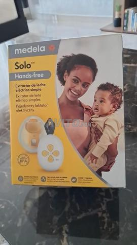 Tire-lait Medela Solo mains libres comme neuf - 2