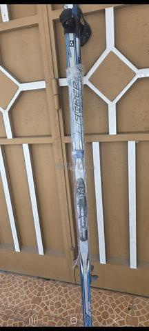 Skis et bottes et bâtons - 2