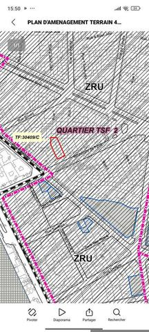 أرض 410م2 تحمل سند ملكية بجوار مسجد الحسن الثاني