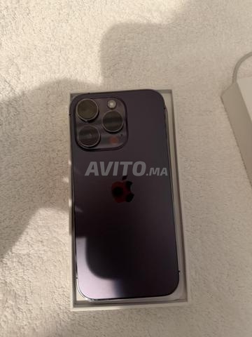 iPhone 14 Pro violet très bon état