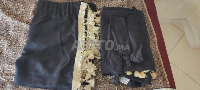 Paire de double rideaux noir et pompons