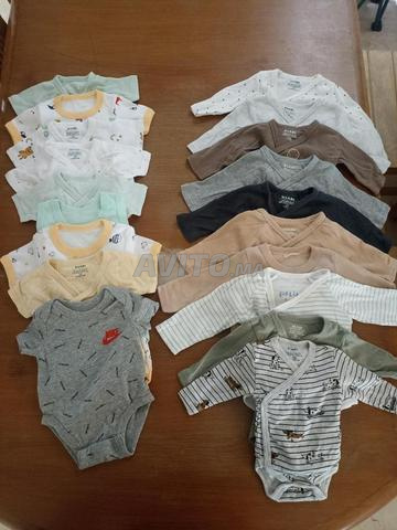 مجموعة ملابس أطفال شهر واحد – حالة جيدة جداً