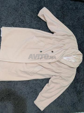 Un manteau élégant avec une qualité exceptionnelle.