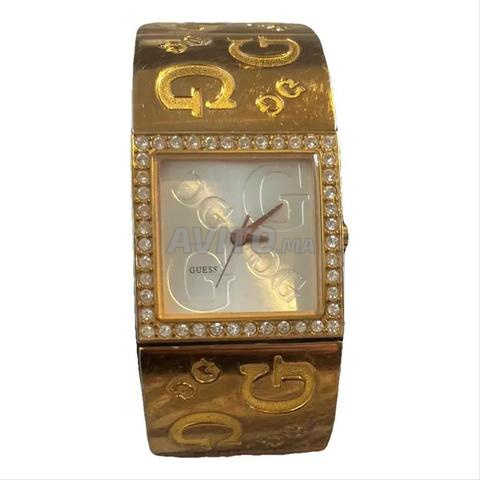 Montre Guess Très bon état Doré, Acier