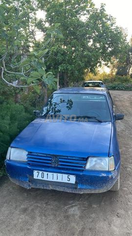 Bonjour, voici une charrette encore en bon état et le travail est bon