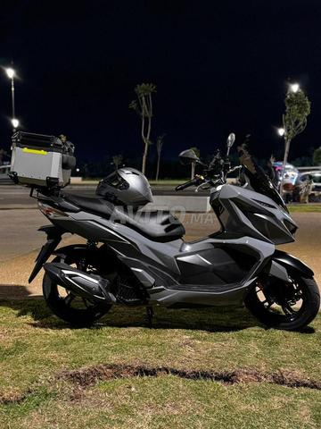 سيم جيت إكس 125 سي سي – مع صندوق خلفي نظيف جداً