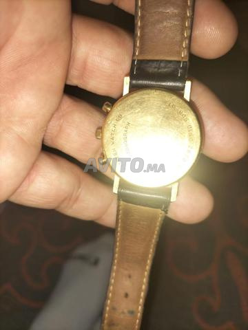 ساعة CITIZEN ذهب عيار 18 - 2