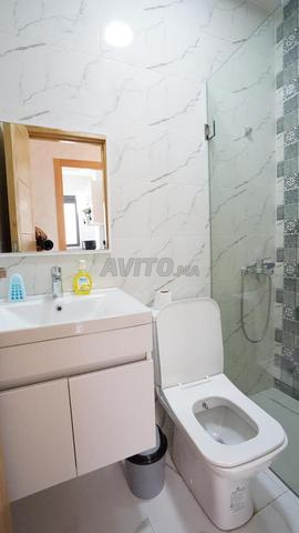 Appartement confortable neuf à louer - image 4