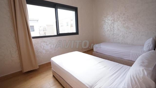 Appartement confortable neuf à louer - image 3