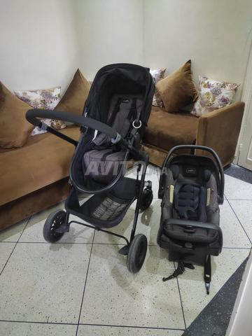 عربة أطفال Evenflo Pivot بحالة جيدة جداً