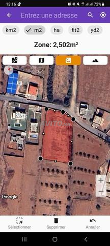 Terrain 2500 m2 sur goudron à Eddir