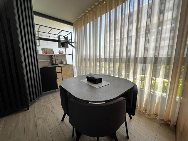 À louer Superbe studio haut standing-90m2 à CFC - image 5