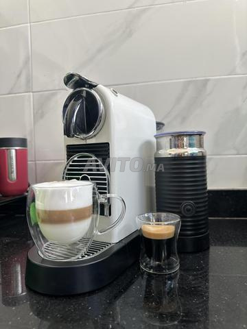 آلة قهوة نسبريسو ضمان شهرين