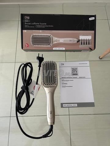 Brosse coiffante lissante 2 en 1