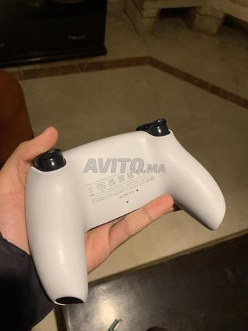 Manette ps5 500 dh fixe - 2