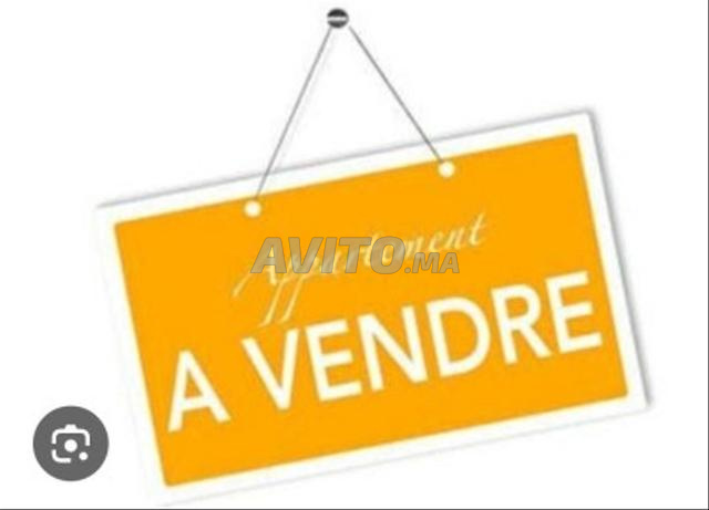 Appartement de trois chambres À VENDRE