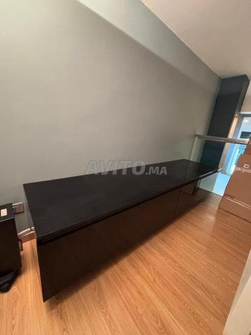 - Meuble bas laqué noir Haworth