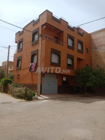 R2 3 façades. Garage. Balcons opposés