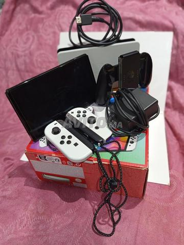 نينتندو سويتش OLED مع هدية - 2