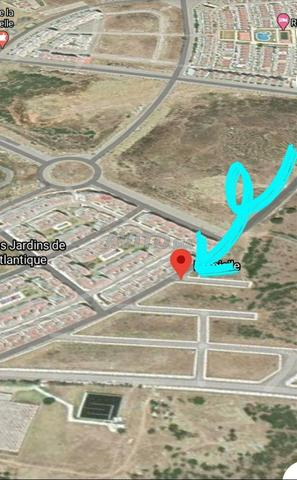 قطعة أرضية محفظة بواجهتين طريق 20م - 2