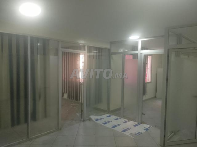 Plateau cloisonné avec ascenseur garage 90m2