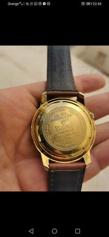 ساعة سويستار أصلية ذهب 23 قيراط - 2