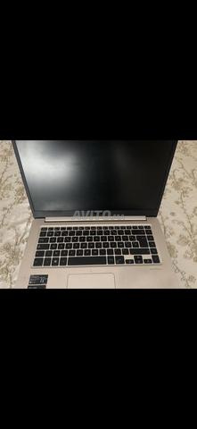 لابتوب أسوس فيفوبوك