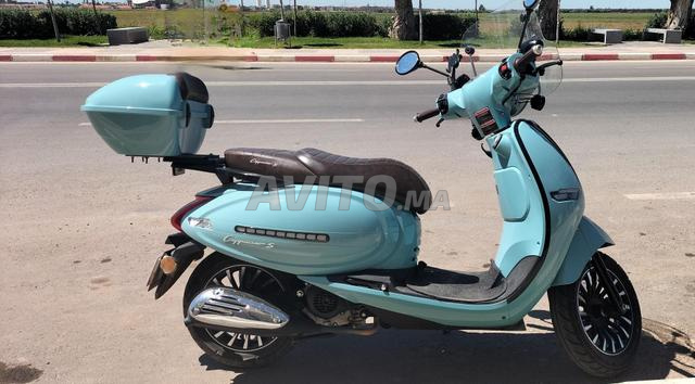 Scooter cappuccino. - 2