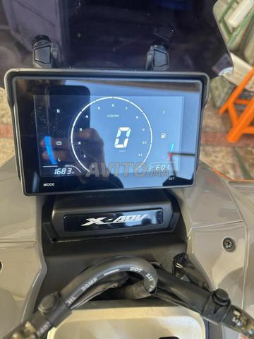 Moto comme neuve, moteur 125