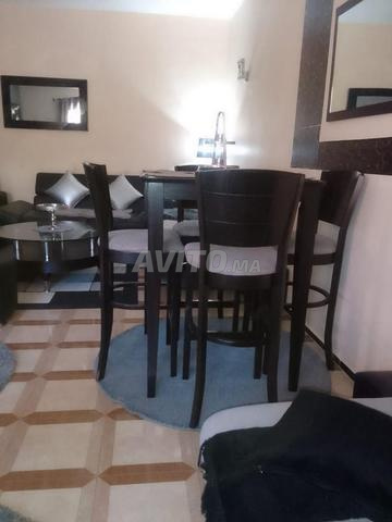 طاولة و 4 كراسي - 2