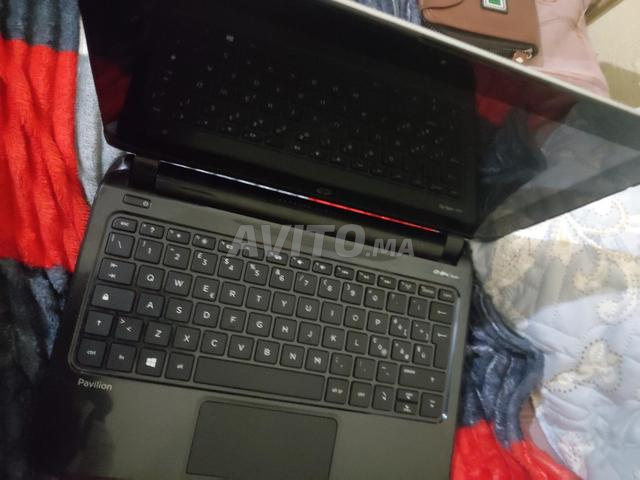 Mini HP tactile en bon état