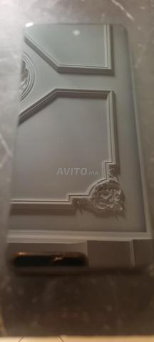 هاتف موتورولا e14 - 2