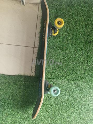 سكيت بورد ديكاتلون مع خوذة بيت وين - 2