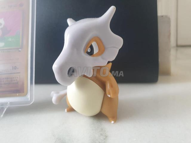 بطاقة بوكيمون برومو كوبون 104 (1998) ومجسم صغير - 2