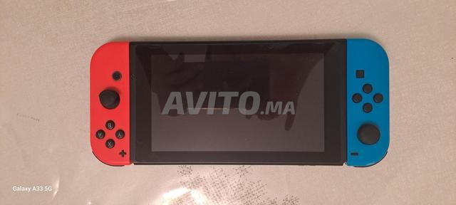 سويتش مع 3 ألعاب مع حقيبة للسفر. - 2