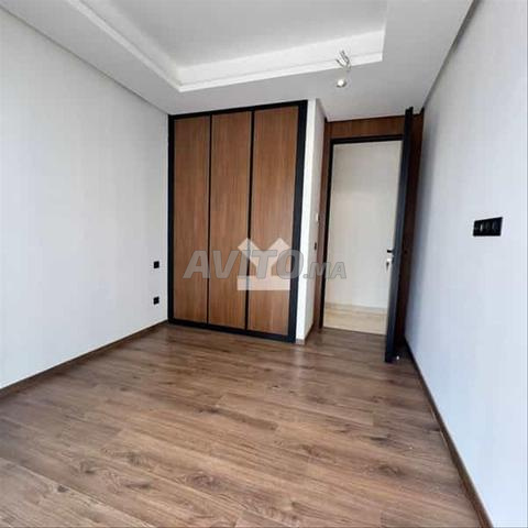 178435-Appt à louer à 18000DH à Casablanca Finance - 2